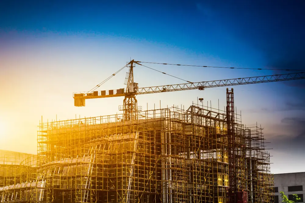 Building under construction with a tower crane